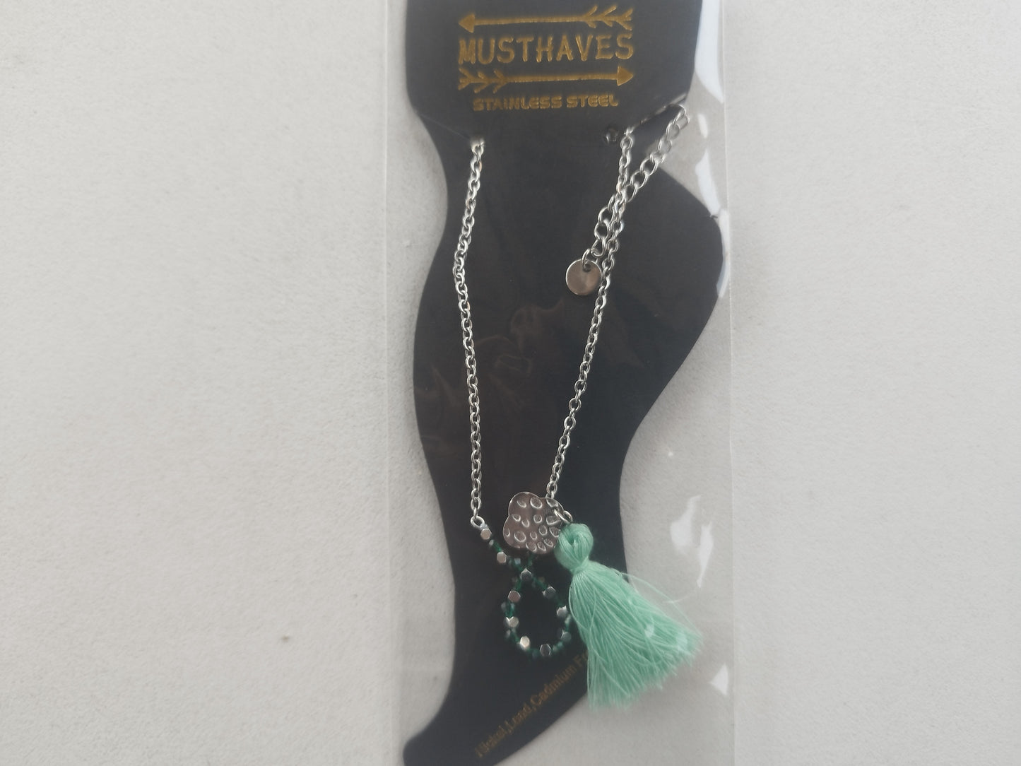 Enkelbandje met glassteentjes en bedel